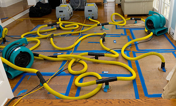 Professional Flood Damage Restoration technician working in Georgetown, GA